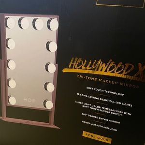 Rose gold vanity light mirror stand